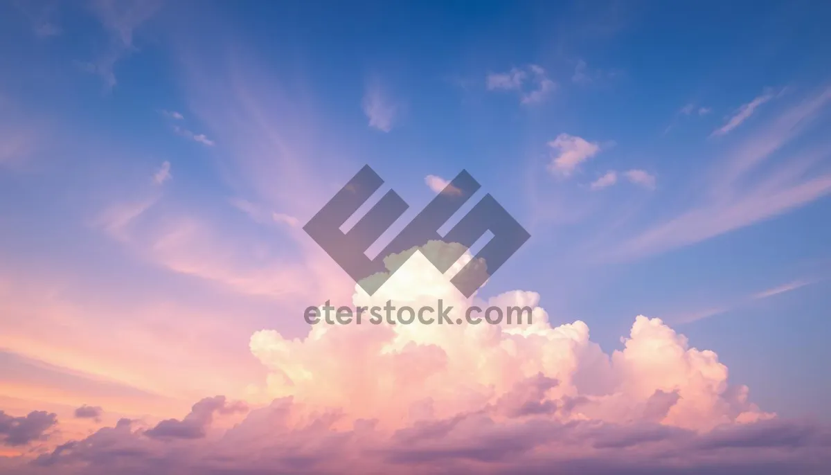 Picture of Summer sky with bright sunlight and fluffy clouds