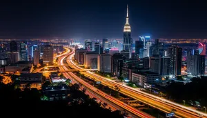 City skyline at dusk with modern buildings and river