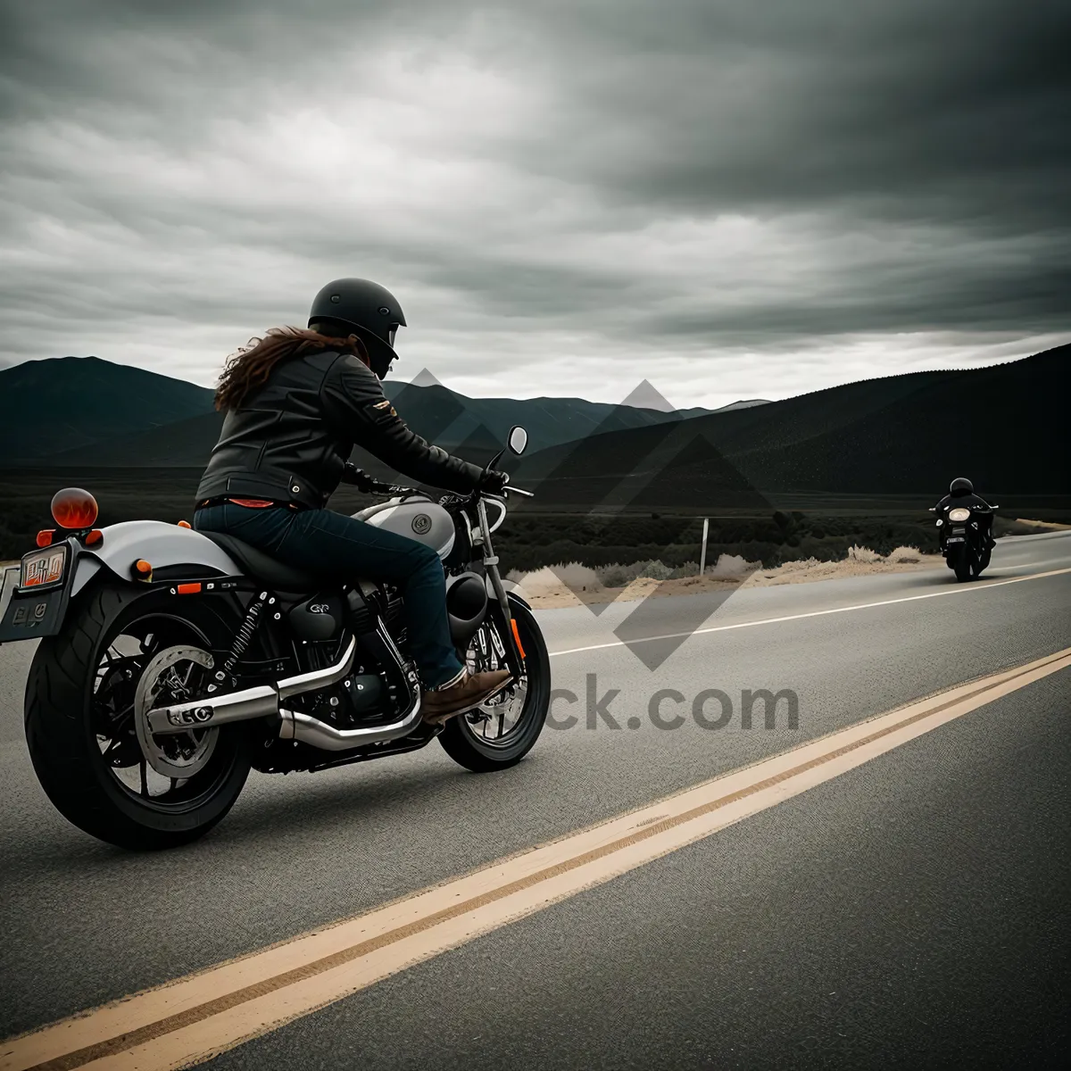 Picture of Thrilling Speed: Racing Bicycle with Rider Wearing Helmet