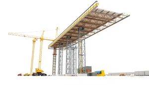 Urban tower construction crane lifting steel frames