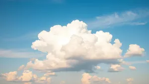 Bright Summer Sky with Fluffy Clouds