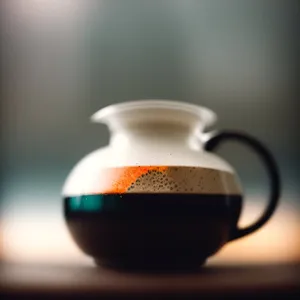 Porcelain coffee cup with saucer and spoon