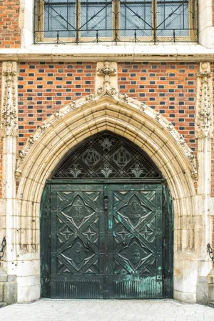 Medieval Cathedral Facade with Stone Arch Entrance