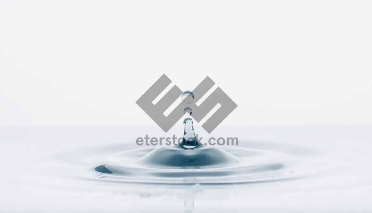 Picture of Crystal Clear Water Splash with Ripples and Reflection