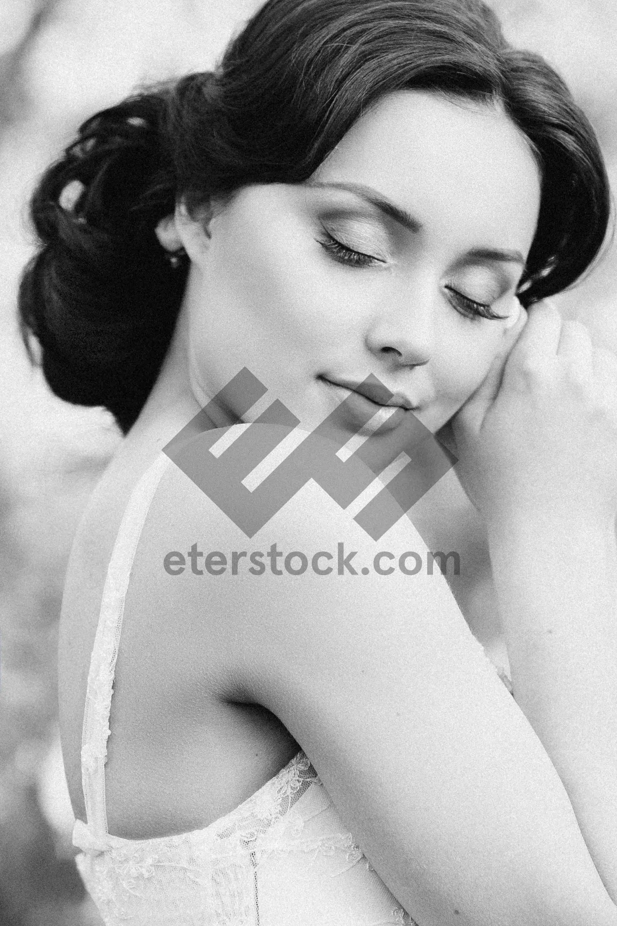 Picture of Attractive brunette lady smiling in bath towel