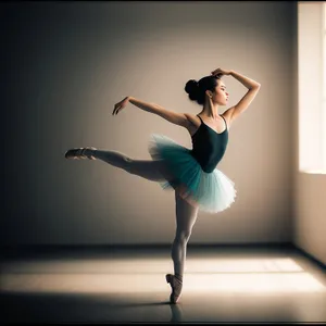 Elegant Ballerina Gracefully Poses in Studio