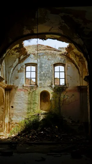 Old cathedral with stone vaulted roof and arches