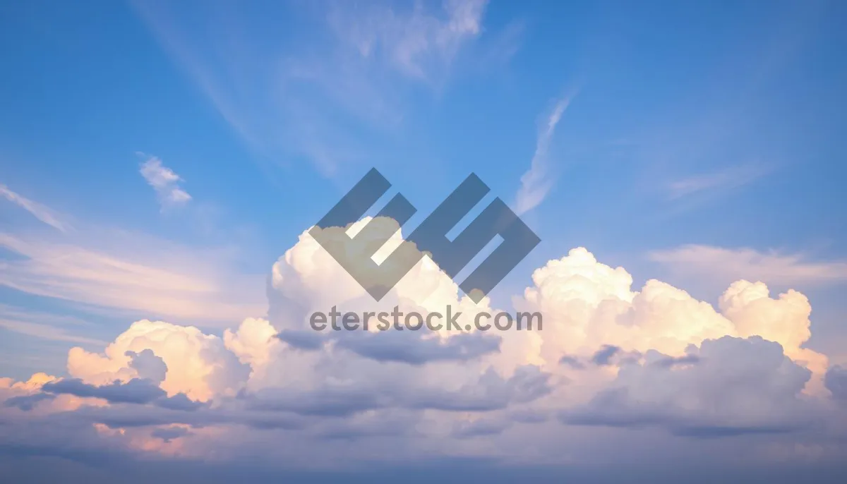 Picture of Vivid Summer Sky with Fluffy Clouds and Sun