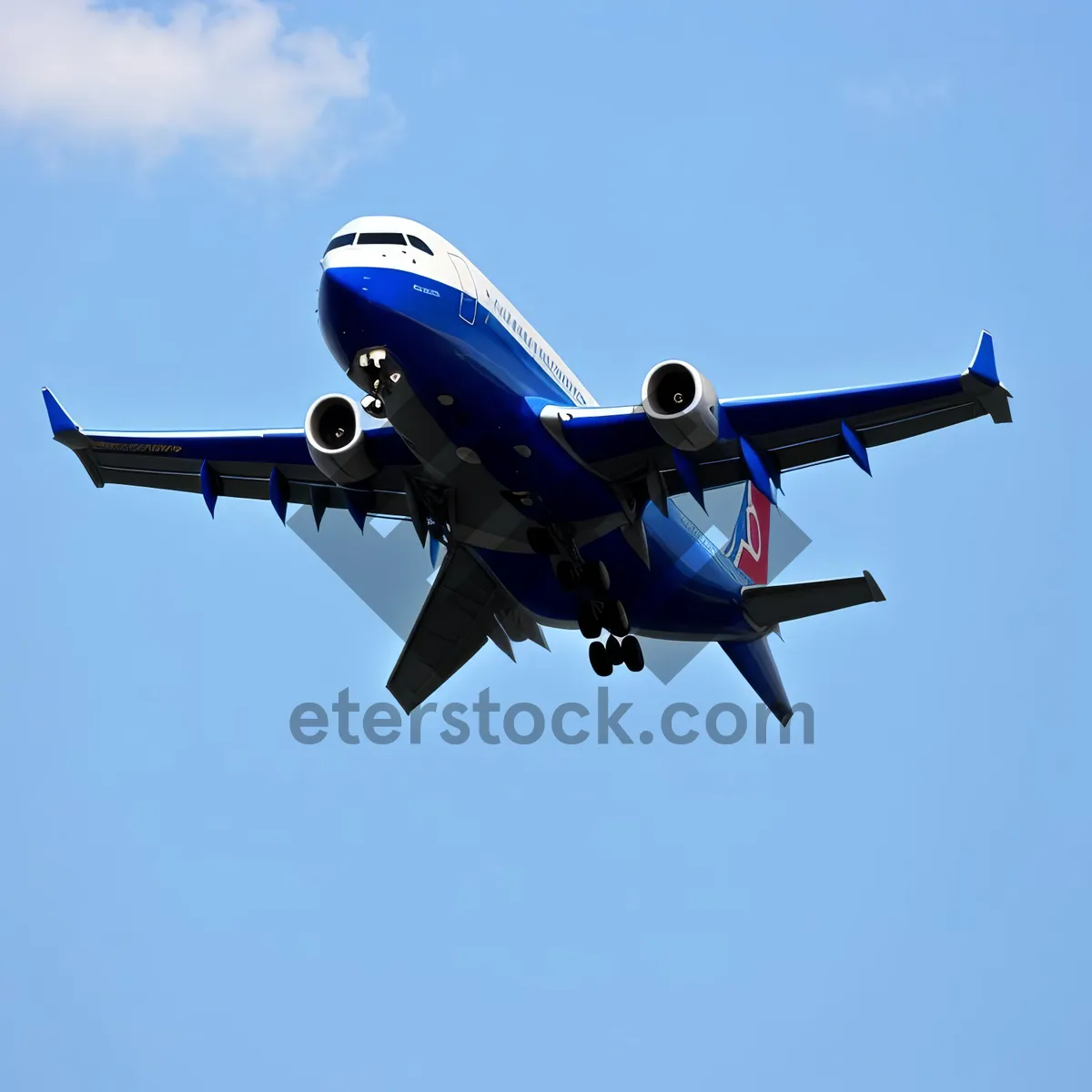 Picture of High-Flying Airliner with Majestic Wings Soaring Through the Sky