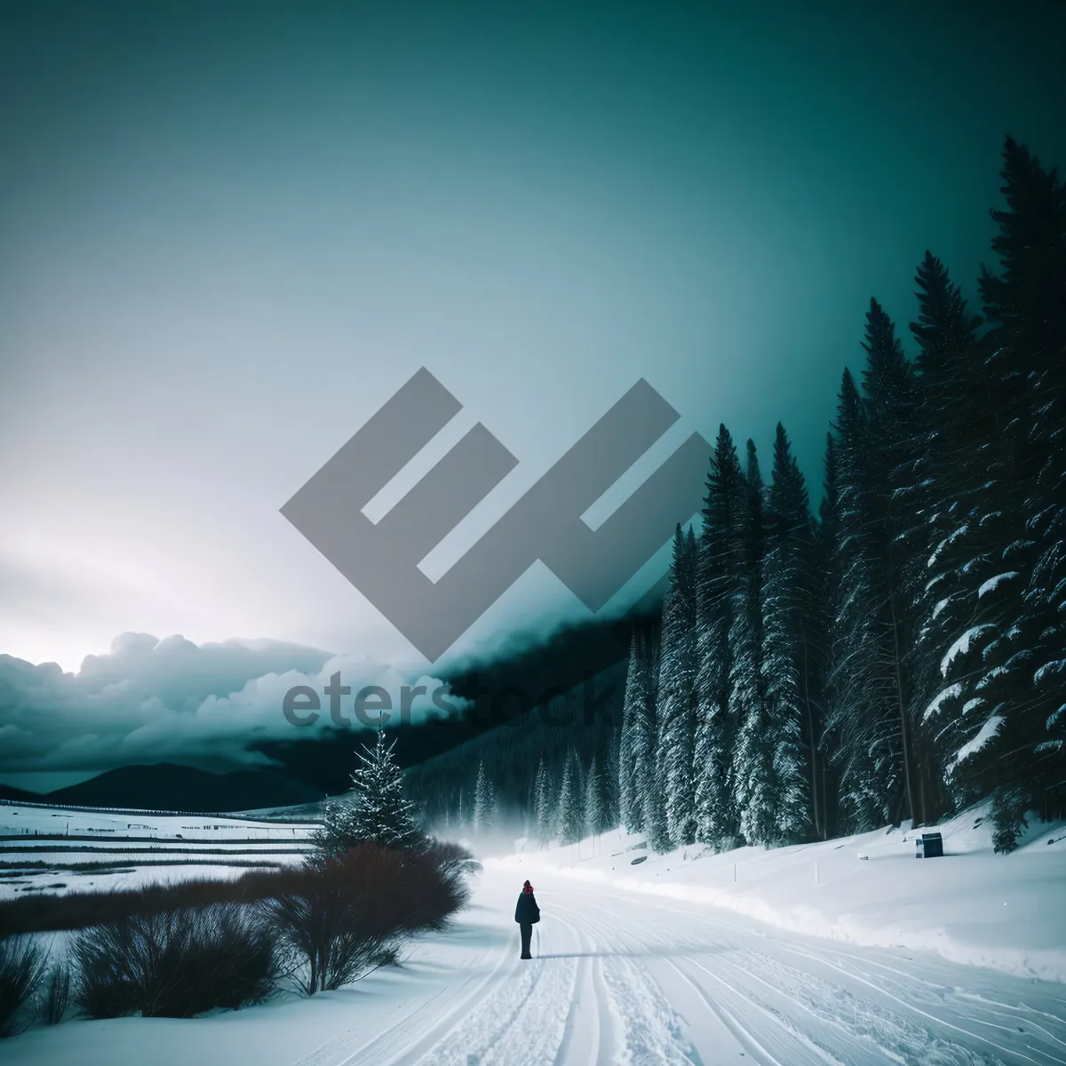 Picture of Winter Wonderland: Majestic Ski Slope Surrounded by Snowy Mountains and Frosty Forest