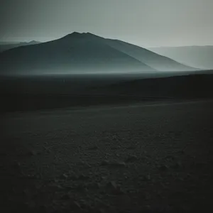 Vast Desert Dunes beneath Majestic Skyline