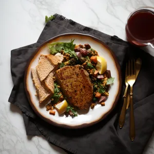 Delicious gourmet plate with healthy grilled meat and vegetables