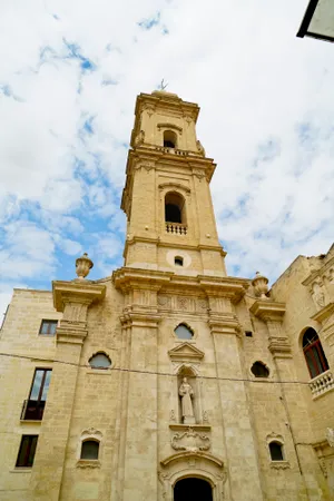 Historic cathedral tower in the city skyline.