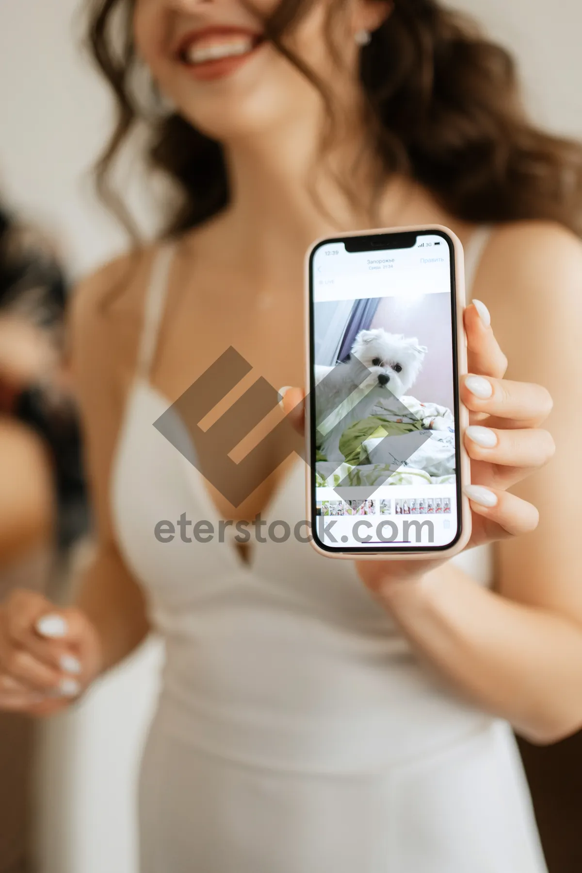 Picture of Happy person holding a camera - lifestyle portrait.