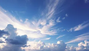 Beautiful Bright Summer Sky with Fluffy Clouds