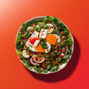 Delicious gourmet vegetable salad with cheese and seafood.