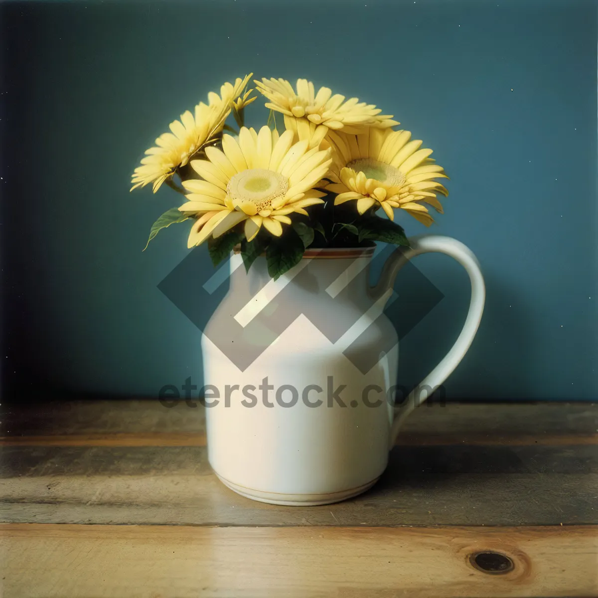 Picture of Morning coffee on table with spoon and mug