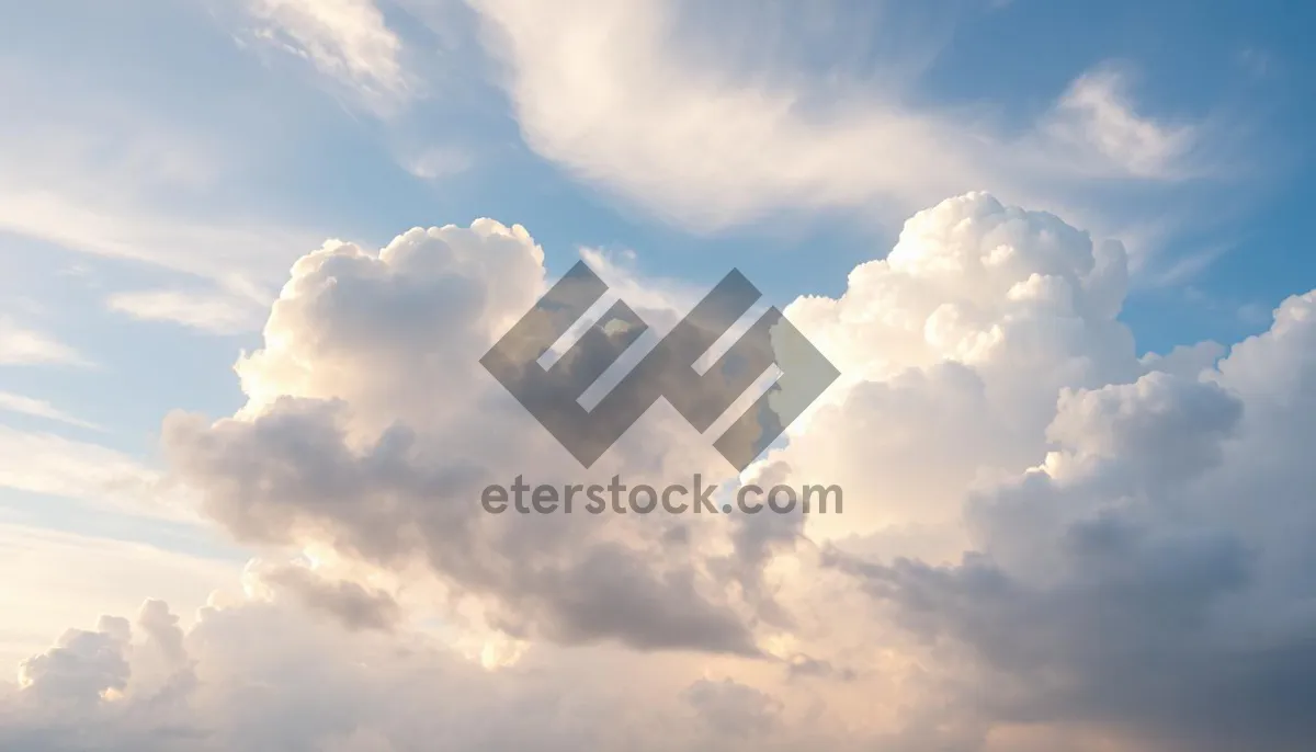 Picture of Bright summer sky with fluffy clouds.