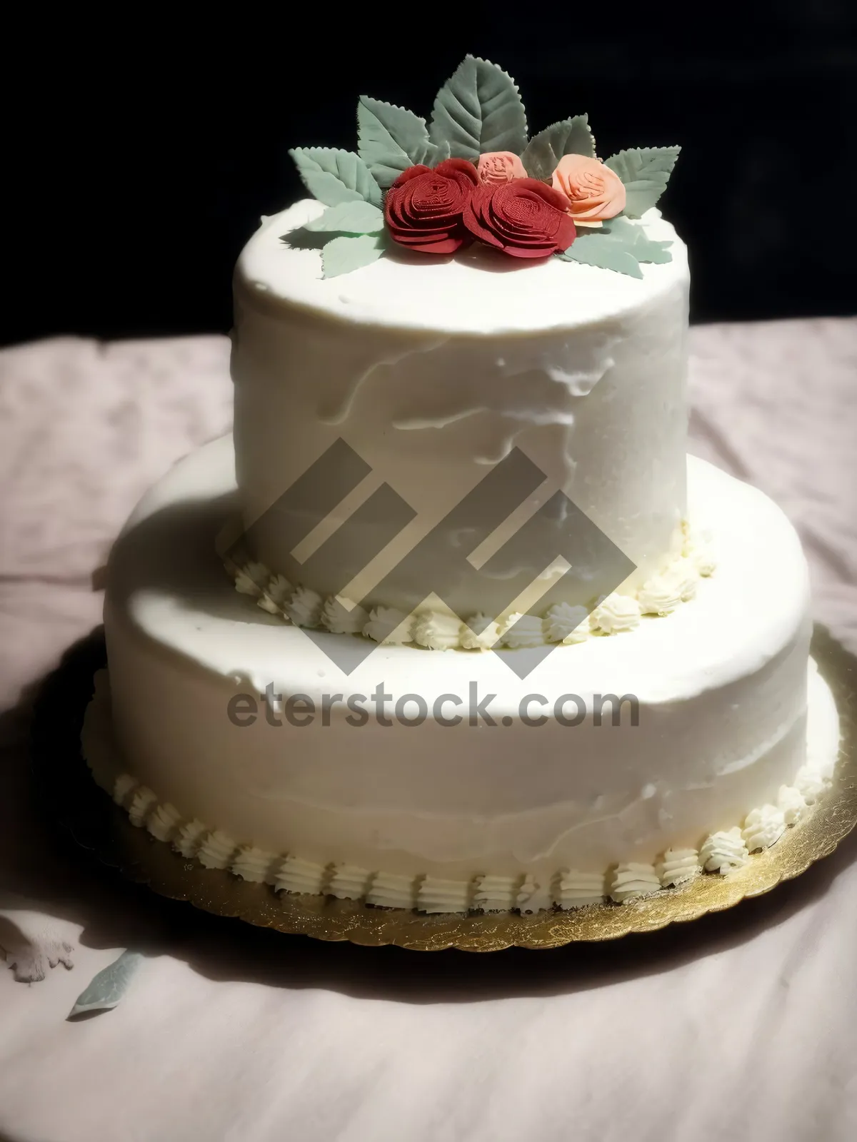 Picture of Delicious strawberry cream cake with chocolate frosting.