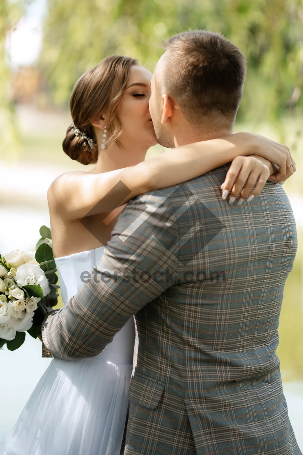 Picture of Happy Wedding Couple Outdoors Smiling Happily