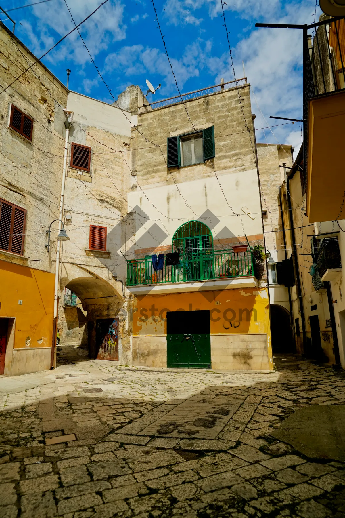 Picture of Ancient urban building with stone walls and windows