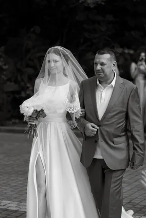 Happy newlywed couple smiling on their wedding day