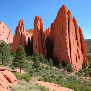 Desert Oasis: Majestic Sandstone Mountains and Cactus Scenery