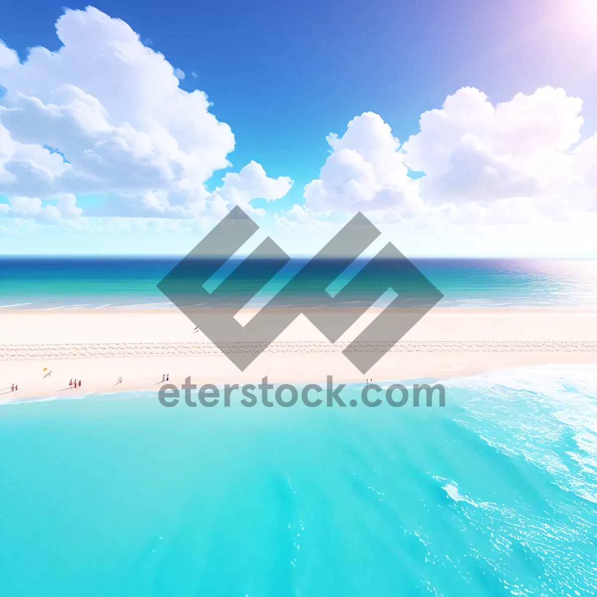 Picture of Tranquil Tropical Coastline: Sun, Sand, and Waves.