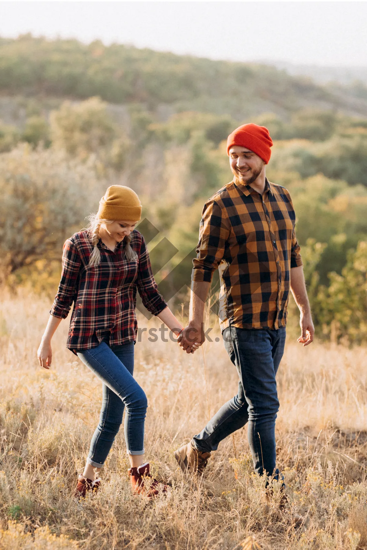 Picture of Happy man hiking in autumn meadow