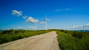 Clean Energy Wind Turbines in Industrial Landscape