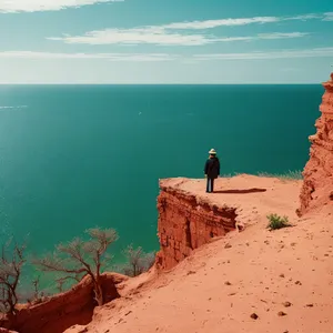 Majestic Sandstone Canyon: A breathtaking natural marvel amidst mountains.