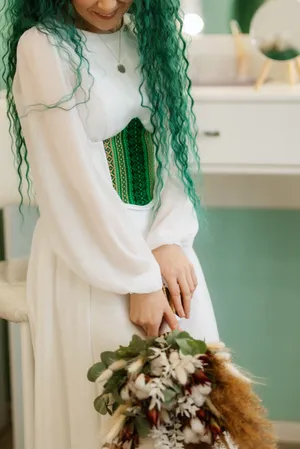 Bride with bouquet of flowers on wedding day