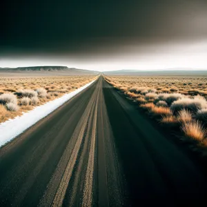 Scenic Highway through Rural Desert Landscape