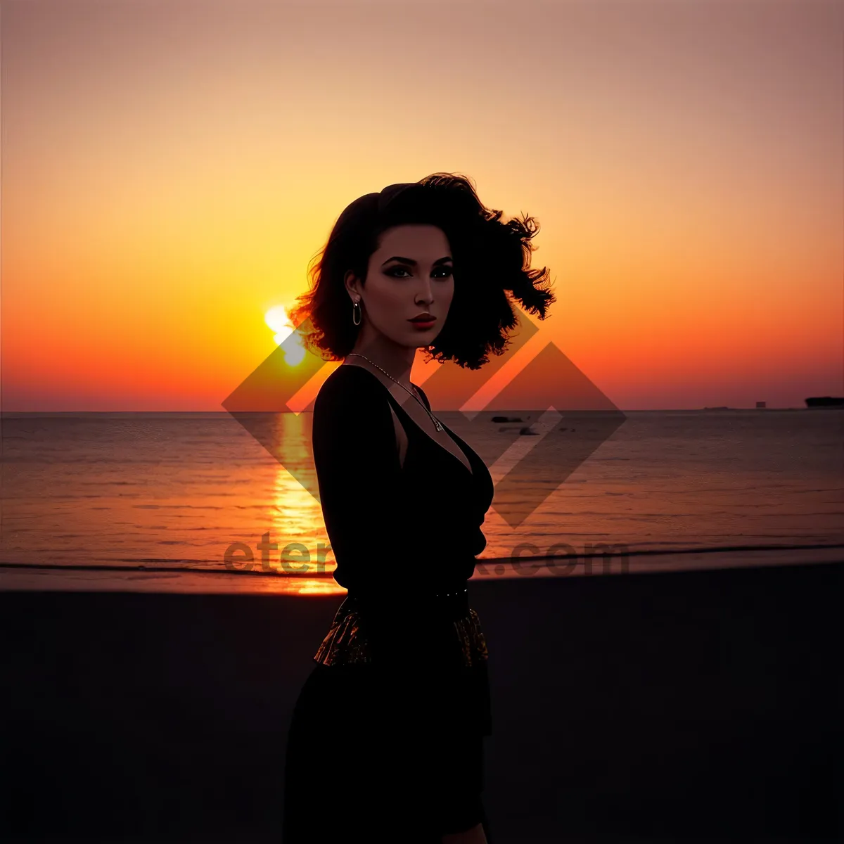 Picture of Silhouette of attractive model enjoying beach at sunset