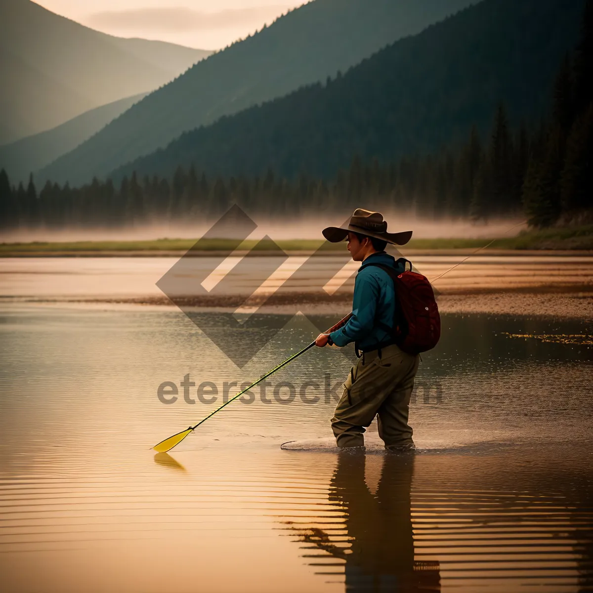 Picture of Fishing at Sunset: Man with Paddle and Rod