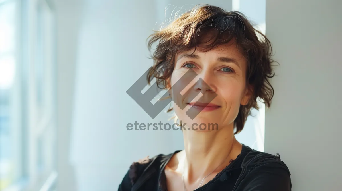 Picture of Smiling businesswoman with headset offering professional support in office