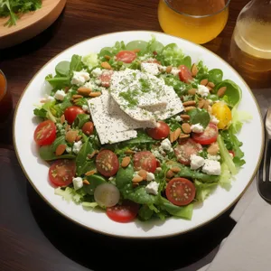 Healthy vegetable salad with fresh cheese and olive oil.