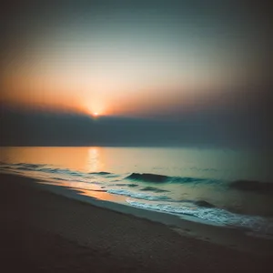 Golden Horizon: Sunset over Beach and Ocean