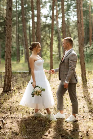 Happy couple celebrating love on wedding day outdoors