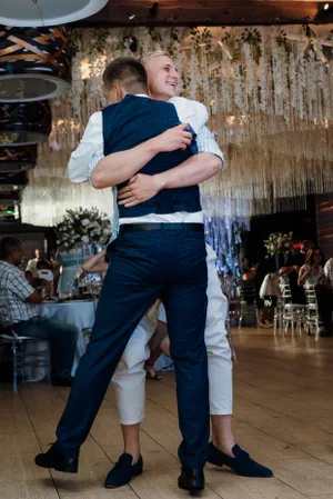 Stylish Male Dancer in Jeans Skating Outdoors