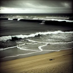 Serene Seascape: Sunset over Ocean and Sandy Beach