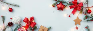 Gold ribbon bow on festive gift box