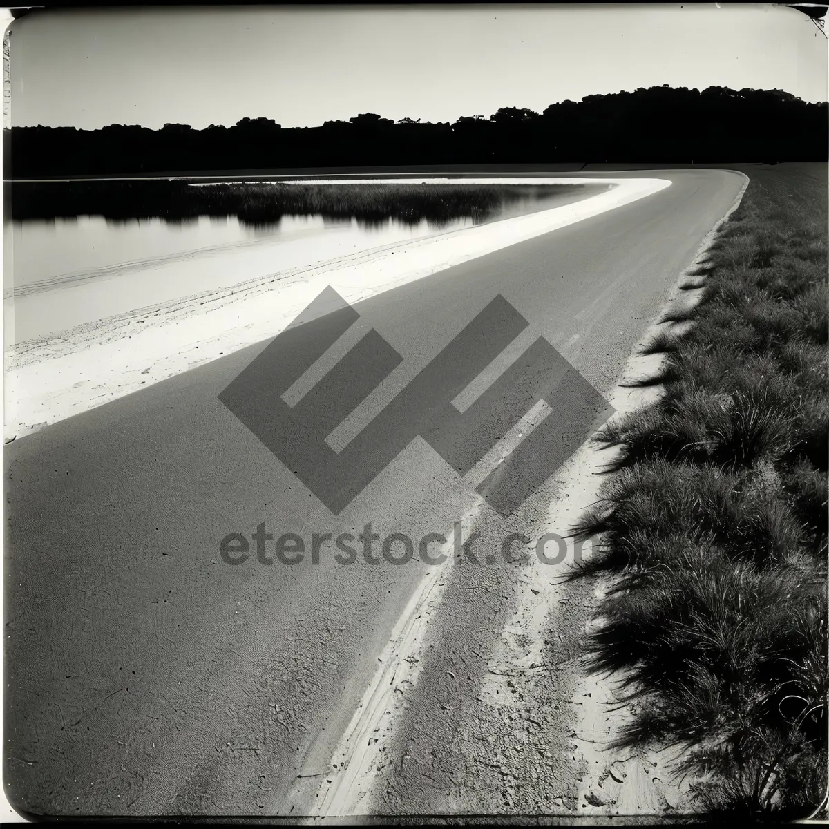 Picture of Snowy Highway Journey Over Cloud-covered Rural Landscape.