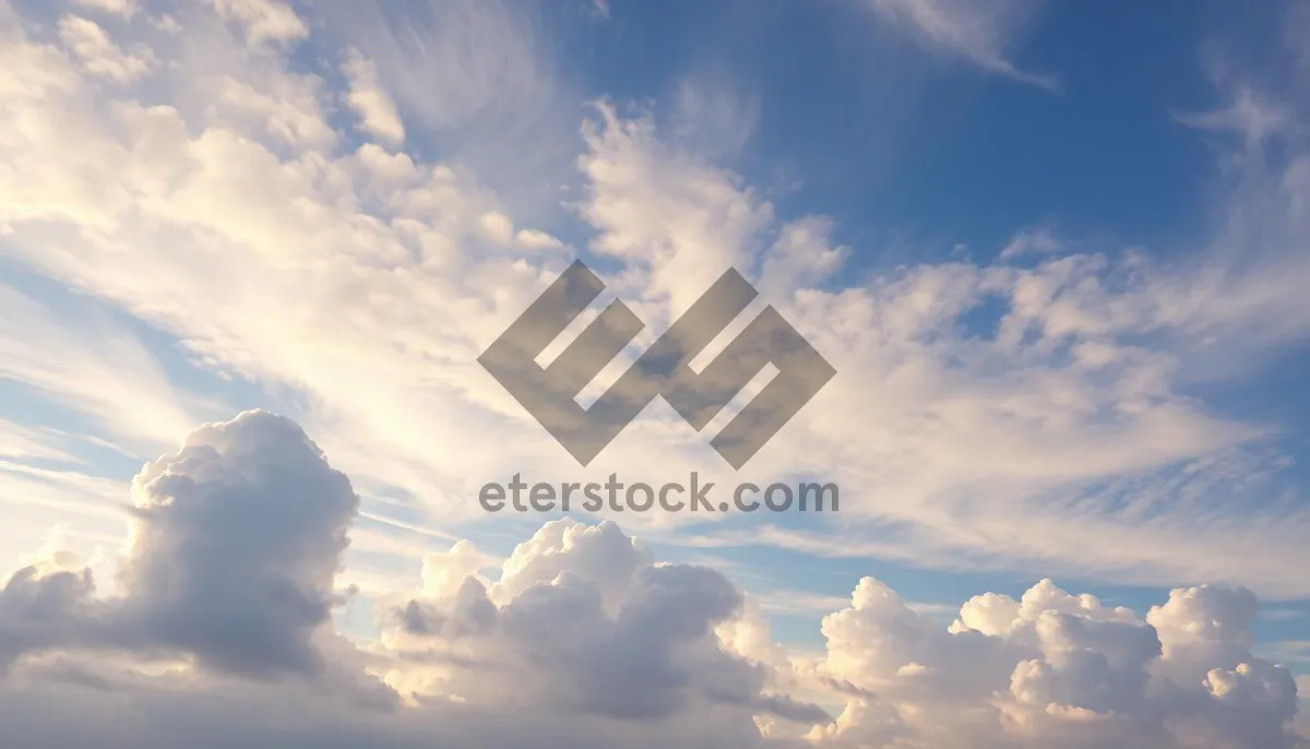 Picture of Bright summer sky with fluffy clouds.