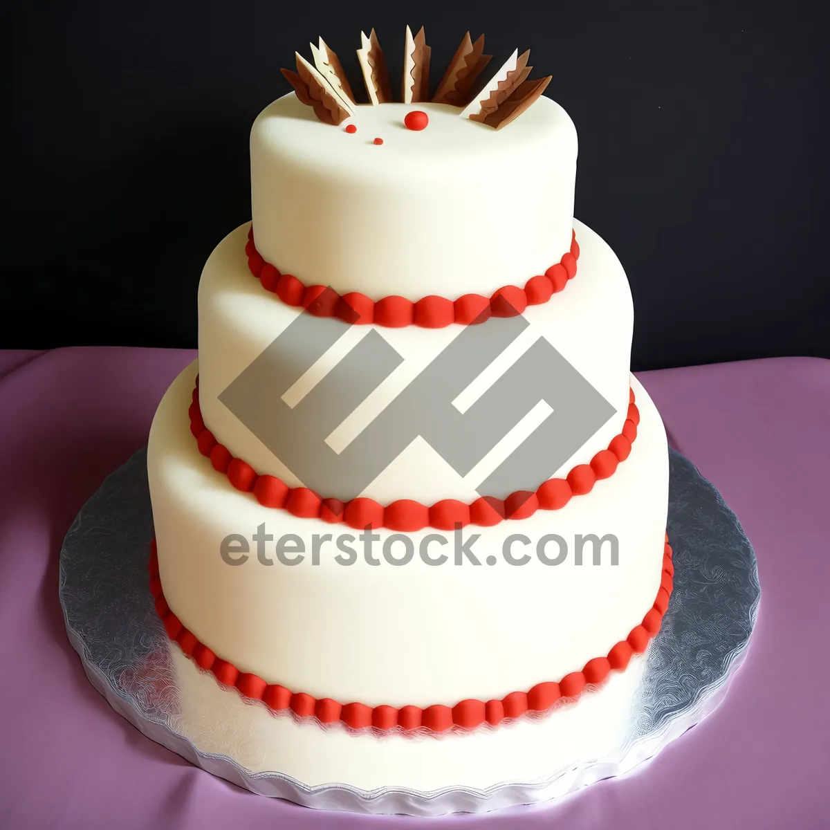 Picture of Delicious Celebration Cake with Pink Icing and Chocolate