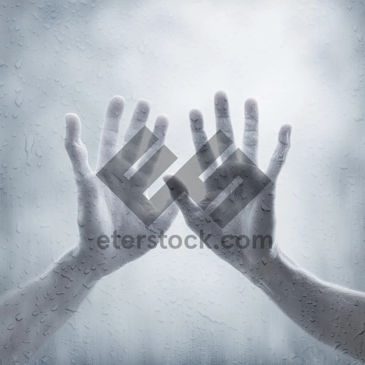 Picture of Pair of Hands On Wet Steamy Glass