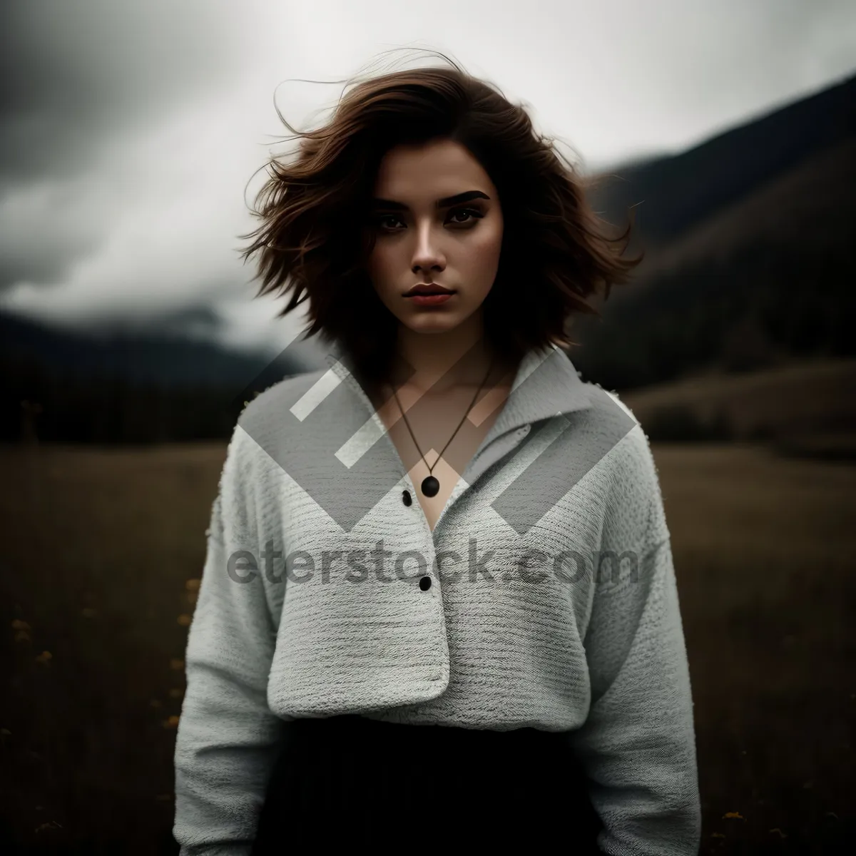 Picture of Stylish brunette businesswoman with happy smile in cardigan.