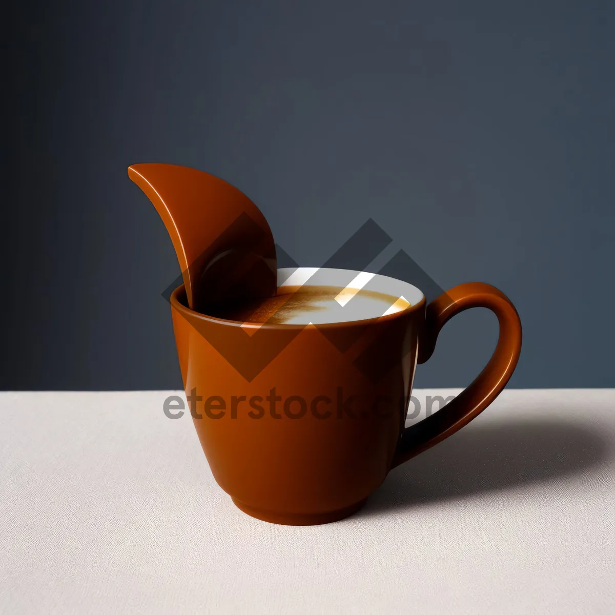 Picture of Steamy morning espresso in a ceramic mug.