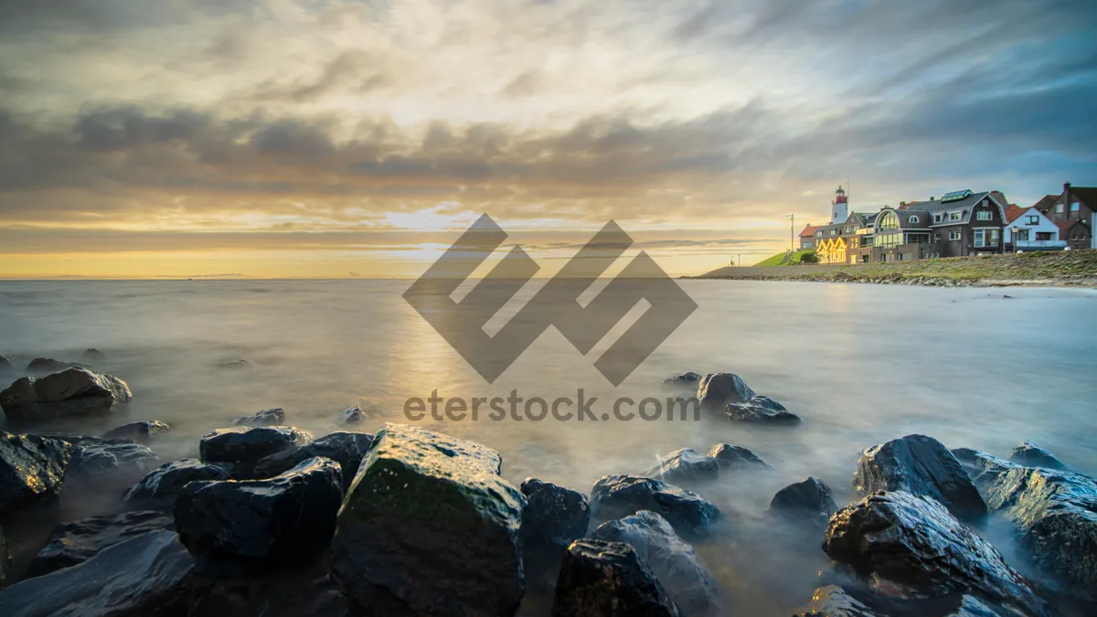 Picture of Sunset waves on scenic shoreline beach