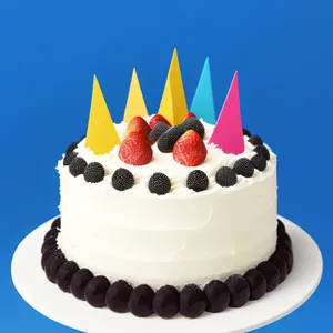Delicious Strawberry Birthday Cake with Chocolate Icing and Candle